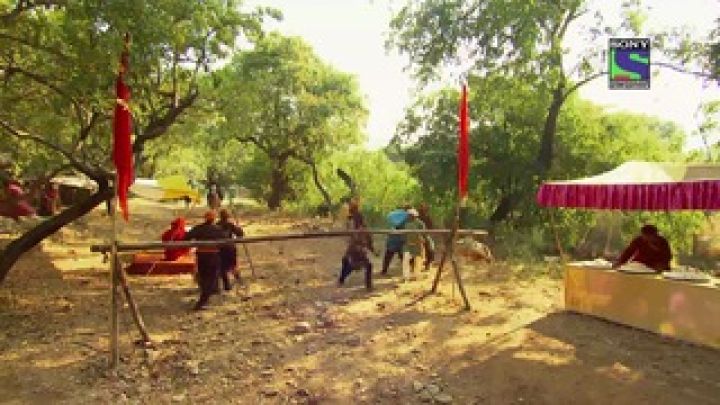 A soldier shoots arrow at Ajab