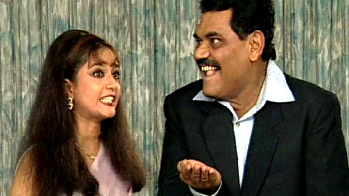 Prem Sits Amongst The Beggars